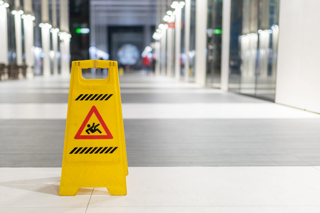 Slip and fall injury claim after accident with no wet floor sign present.